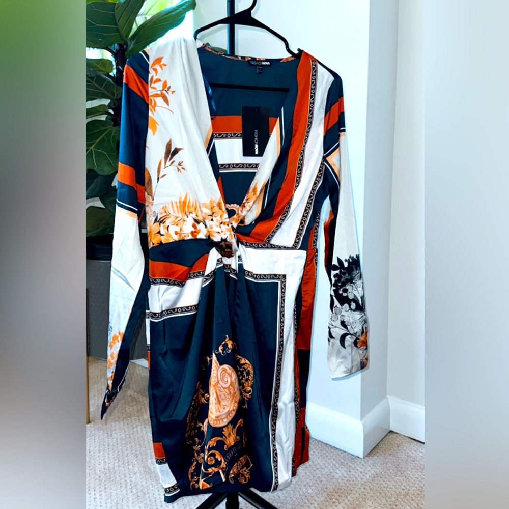 Never before worn satin dress w/ tags. Very good condition